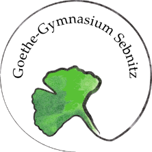 KI generiert: Das Bild zeigt ein grünes Ginkgo-Blatt, das von einem schwarzen Kreis umgeben ist. Der Hauptinhalt scheint ein stilisiertes Logo oder Symbol zu sein.