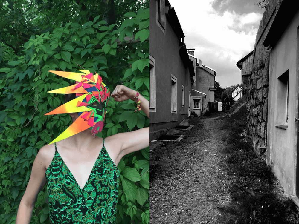 KI generiert: Das Bild zeigt eine Person mit einem farbenfrohen, geometrischen Maskenkostüm, die in einer grünen Umgebung steht, während der Hintergrund eine schmale Gasse mit Häusern in Schwarz-Weiß zeigt. Der Hauptinhalt des Bildes ist der Kontrast zwischen der lebendigen, farbigen Maske und der sonst monochromen Umgebung.