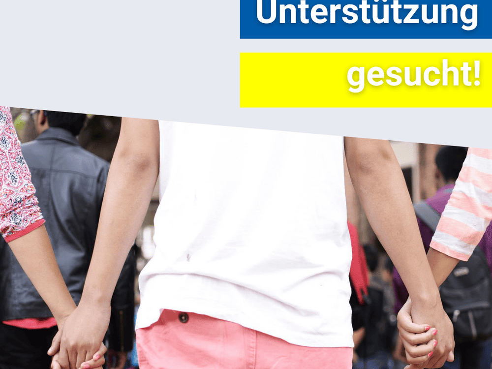 KI generiert: Das Bild zeigt eine Gruppe von Personen, die sich an den Händen halten, wobei der Fokus auf den Händen und der Kleidung der Personen liegt. Der Hauptinhalt des Bildes ist die Darstellung von Verbundenheit und Gemeinschaft.