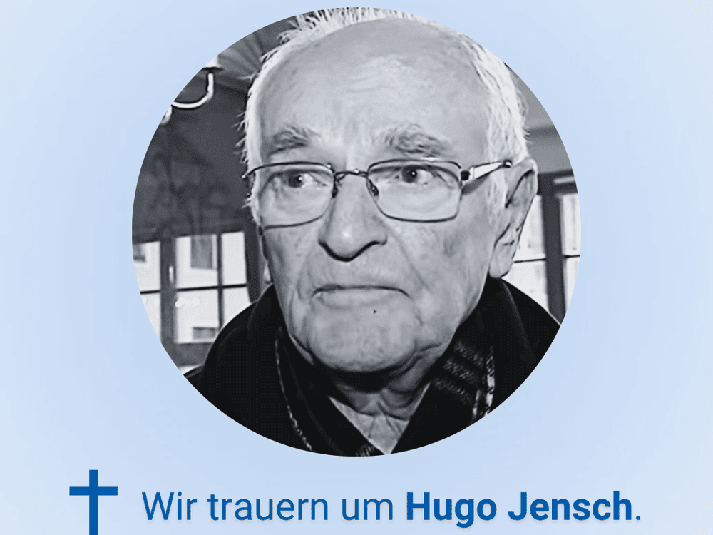 KI generiert: Das Bild zeigt ein schwarzes und weißes Porträtfoto eines älteren Mannes mit Brille, daneben steht der Text "Wir trauern um Hugo Jensch." Der Hauptinhalt des Bildes ist eine Trauerbekundung für Hugo Jensch.